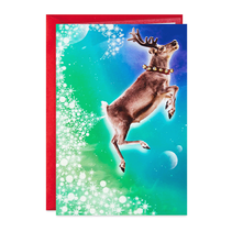 Card with reindeer farting snowflakes.