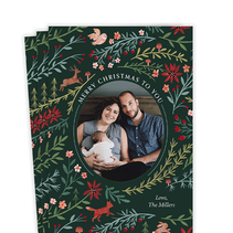 Card with Christmas greenery surrounding a photo and ‘Merry Christmas to you’ above the photo.