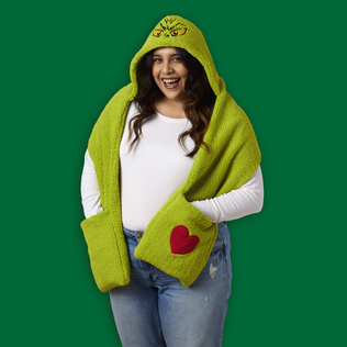 Woman wearing Grinch hooded scarf