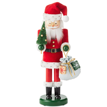 Santa holding a tree and gift bag nutcracker